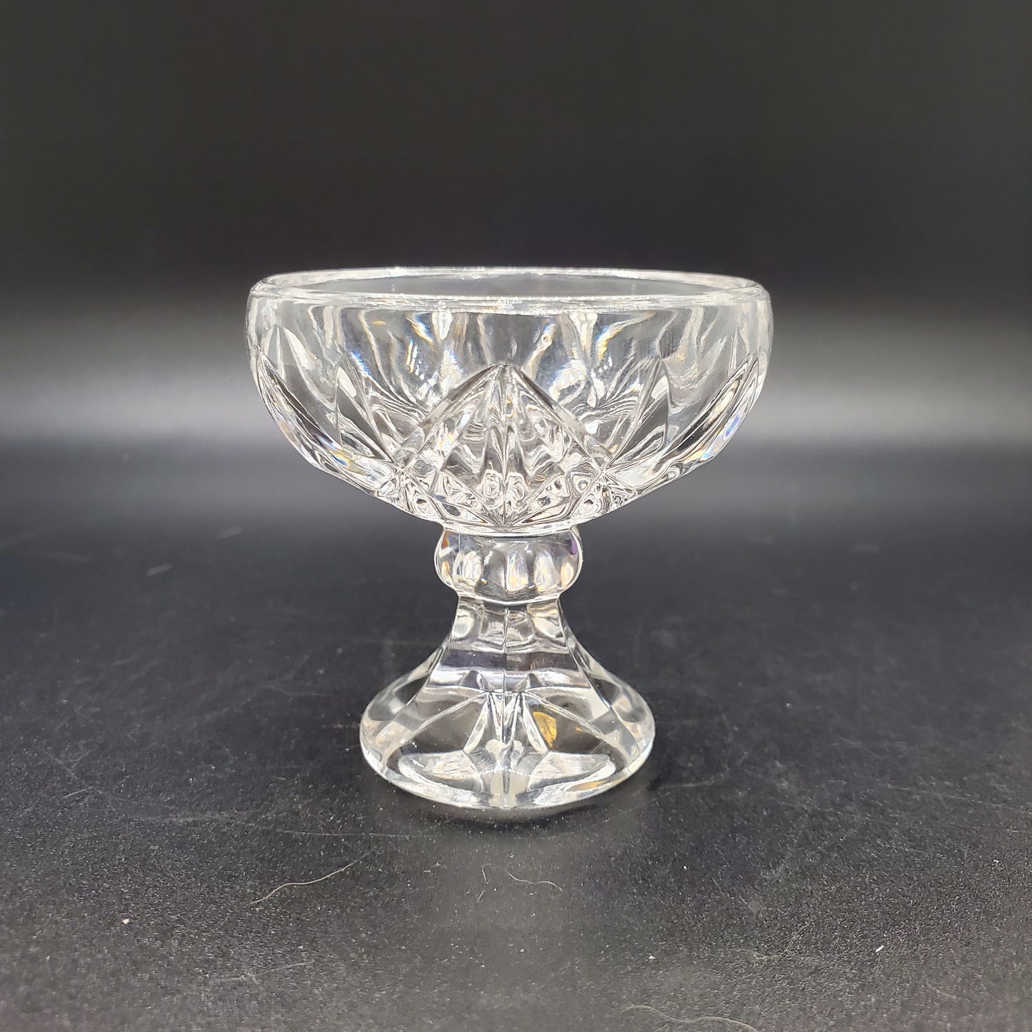 Vintage Glass Pedestal Round Salt Cellar with a Cross Cut Pattern and Star Base